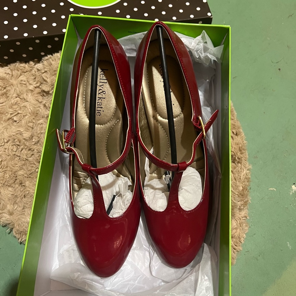Brand new red high heels in a box 3 inches